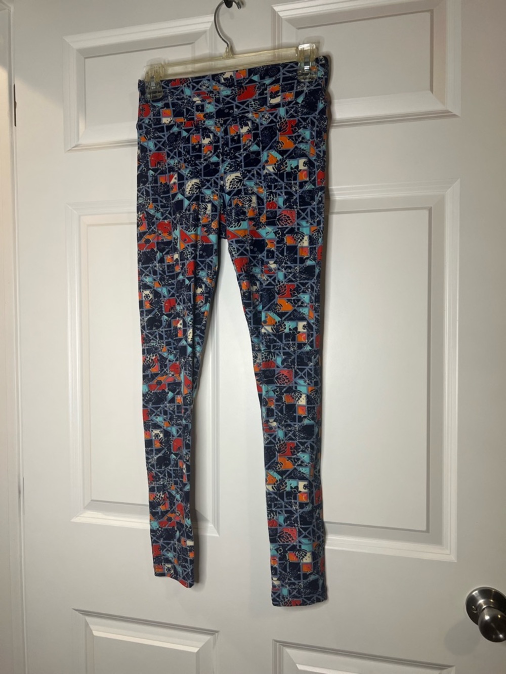 LuLaRoe Navy Leggings with Orange, Teal & Red Geometric Print